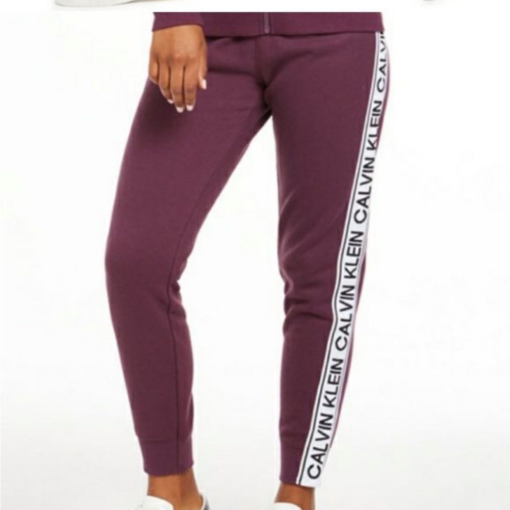 Calvin Klein brand new sweatpants. Size Large, Color purple. With tags